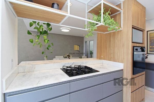 Casa em Porto Alegre, no bairro Espírito Santo, com 3 dormitório(s), e 3 banheiros, à venda.