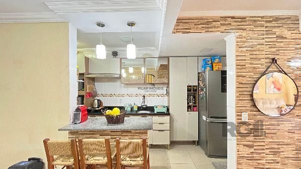 Casa Condominio em Porto Alegre, no bairro Hípica, com 3 dormitório(s), e 3 banheiros, à venda.