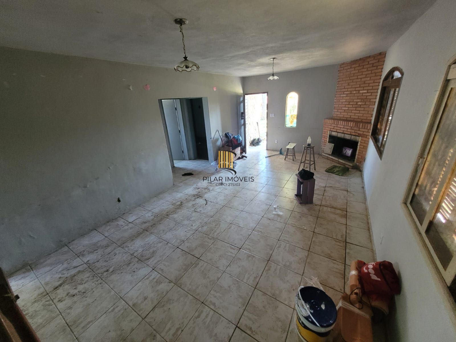 Ótimo terreno com casa na Ponta Grossa.