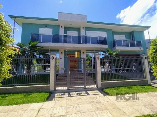 Casa em Porto Alegre, no bairro Hípica, com 3 dormitório(s), e 3 banheiros, à venda. - Pilar Imóveis