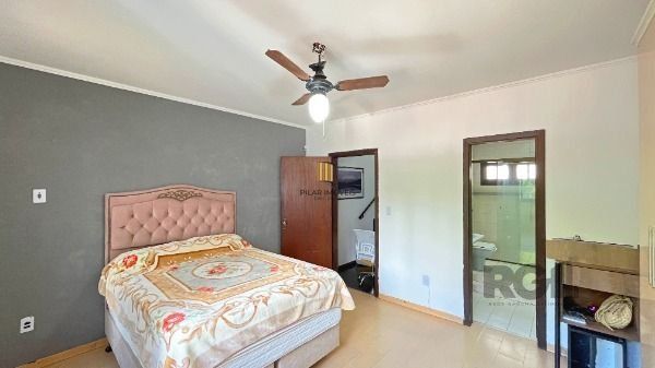 Casa 4 dormitórios no bairro Camaquã