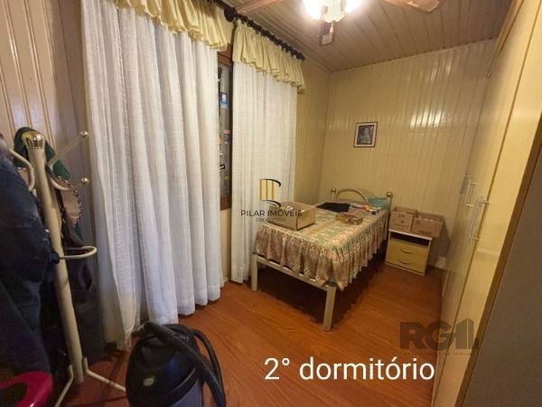 Casa 3 dormitórios no bairro Camaquã