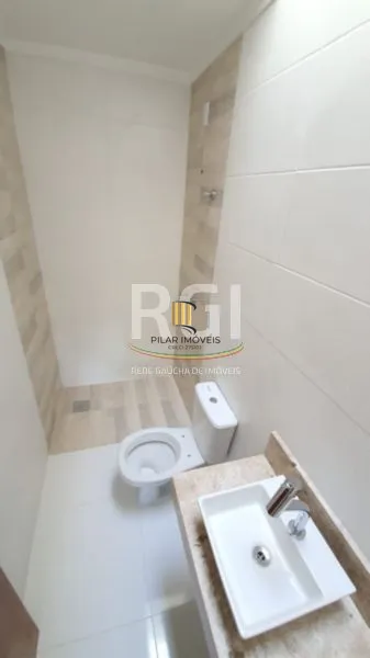 Casa 3 dormitórios no bairro Guarujá