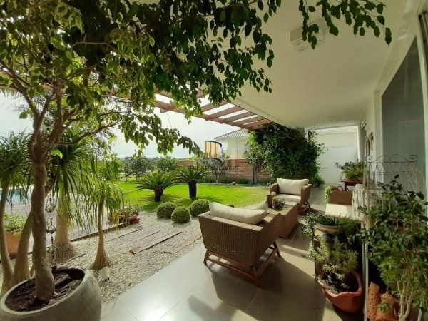 Casa Condominio em Porto Alegre, no bairro Belém Novo, com 3 dormitório(s), e 3 banheiros, à venda.