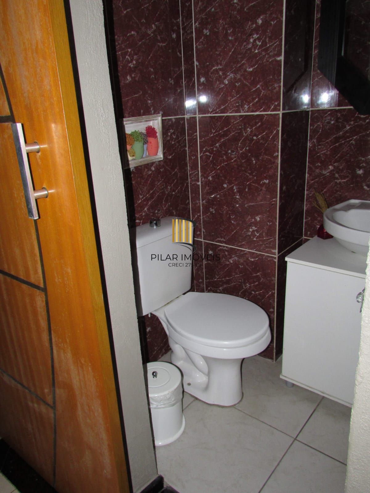 Casa na Zona sul de Porto Alegre com 02 dormitórios e pátio.