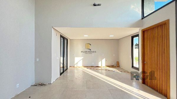 Casa Condominio em Porto Alegre, no bairro Hípica, com 3 dormitório(s), e 3 banheiros, à venda.