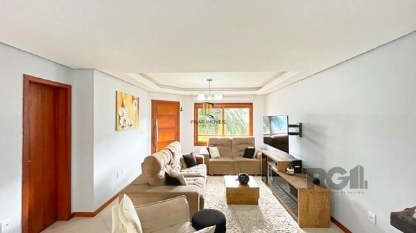 Casa em Porto Alegre, no bairro Hípica, com 3 dormitório(s), e 3 banheiros, à venda.