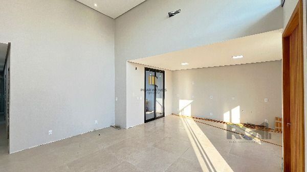 Casa Condominio em Porto Alegre, no bairro Hípica, com 3 dormitório(s), e 3 banheiros, à venda.
