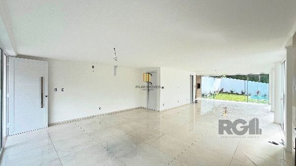 Casa Condominio em Porto Alegre, no bairro Hípica, com 3 dormitório(s), à venda.