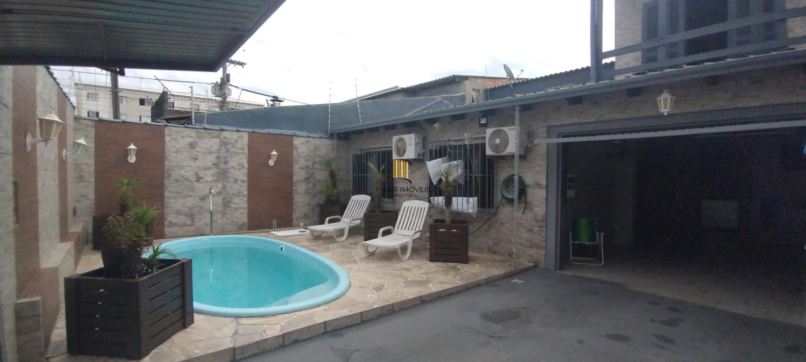 Casa com piscina e com 4 dormitorios no bairro Restinga - Pilar Imóveis