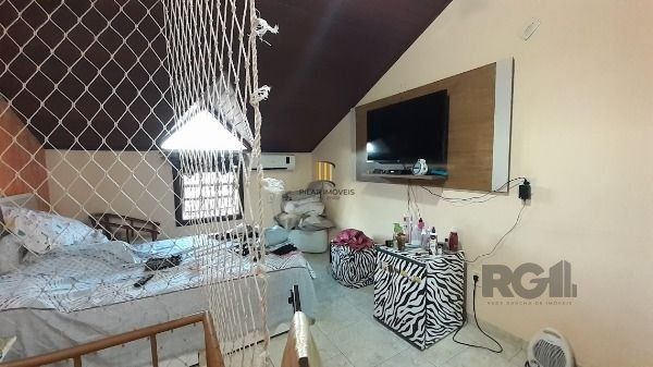 Casa Condominio em Porto Alegre, no bairro Vila Nova, com 3 dormitório(s), à venda.