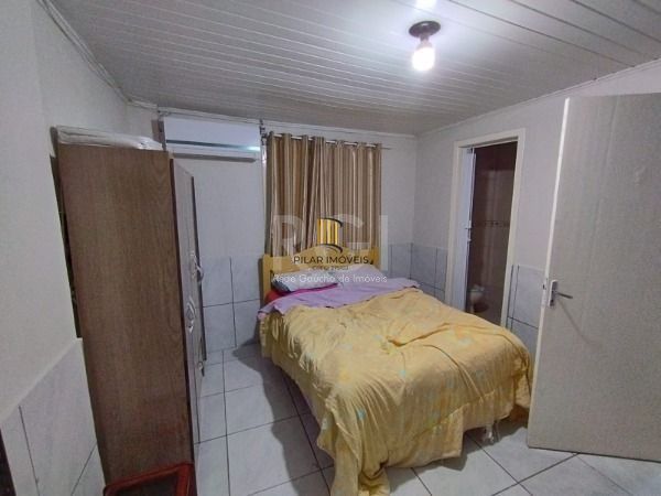 Casa em Porto Alegre, no bairro Belém Novo, com 5 dormitório(s), e 5 banheiros, à venda.