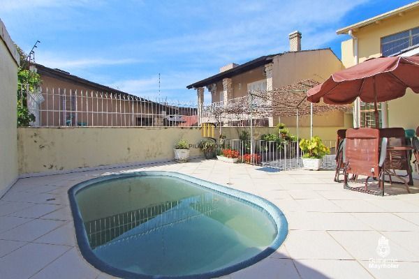 Casa para Venda - 229.6m², 3 dormitórios, sendo 1 suites, 4 vagas - Cavalhada