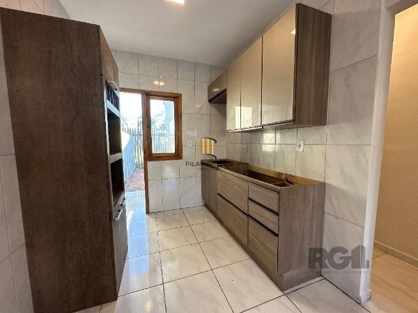 Casa Condominio em Porto Alegre, no bairro Ponta Grossa, com 2 dormitório(s), e 2 banheiros, à venda.