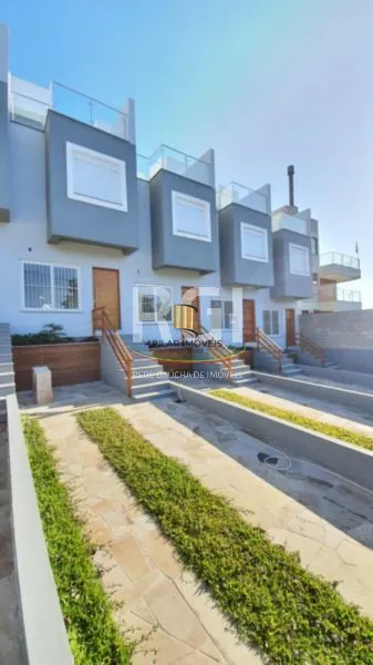 Casa 3 dormitórios no bairro Guarujá