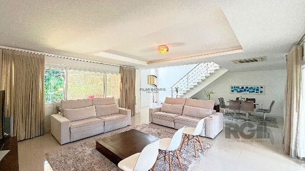 Casa Condominio em Porto Alegre, no bairro Hípica, com 3 dormitório(s), e 3 banheiros, à venda.