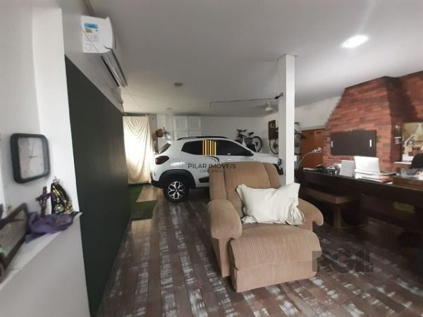 Casa 4 dormitórios no bairro Menino Deus