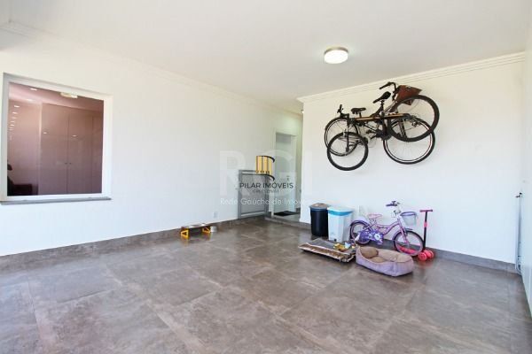 Casa Condominio em Porto Alegre, no bairro Hípica, com 3 dormitório(s), e 3 banheiros, à venda.