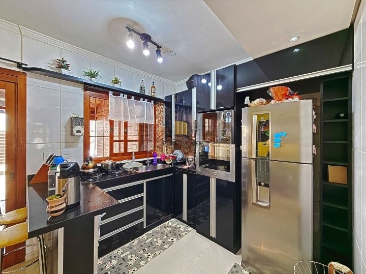 Casa de Condomínio 3 dormitórios no bairro Hípica