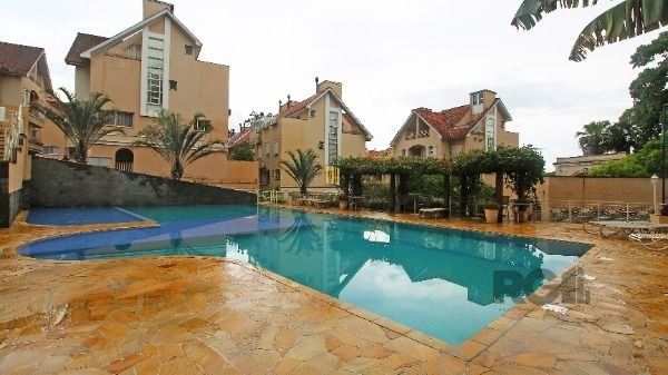 Casa Condominio em Porto Alegre, no bairro Pedra Redonda, com 3 dormitório(s), e 3 banheiros, à venda.