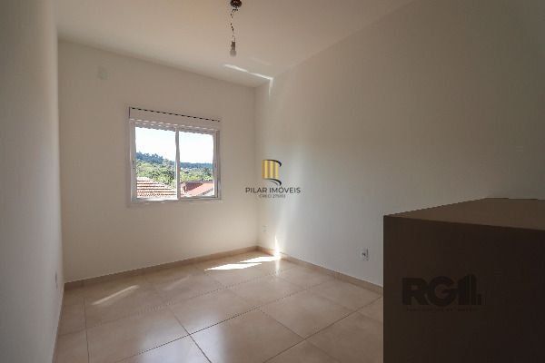 Casa Condominio em Porto Alegre, no bairro Vila Nova, com 2 dormitório(s), e 2 banheiros, à venda.
