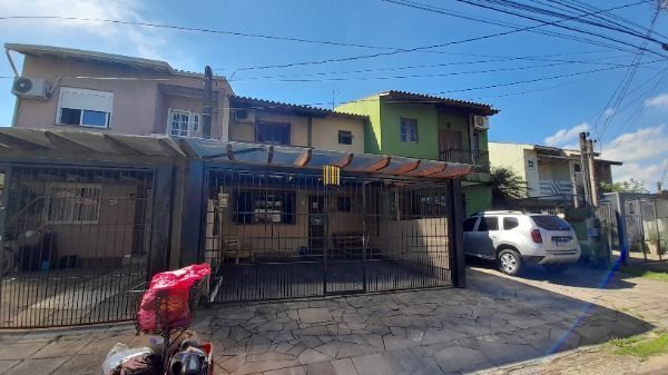 Casa em Porto Alegre, no bairro Hípica, com 3 dormitório(s), à venda.