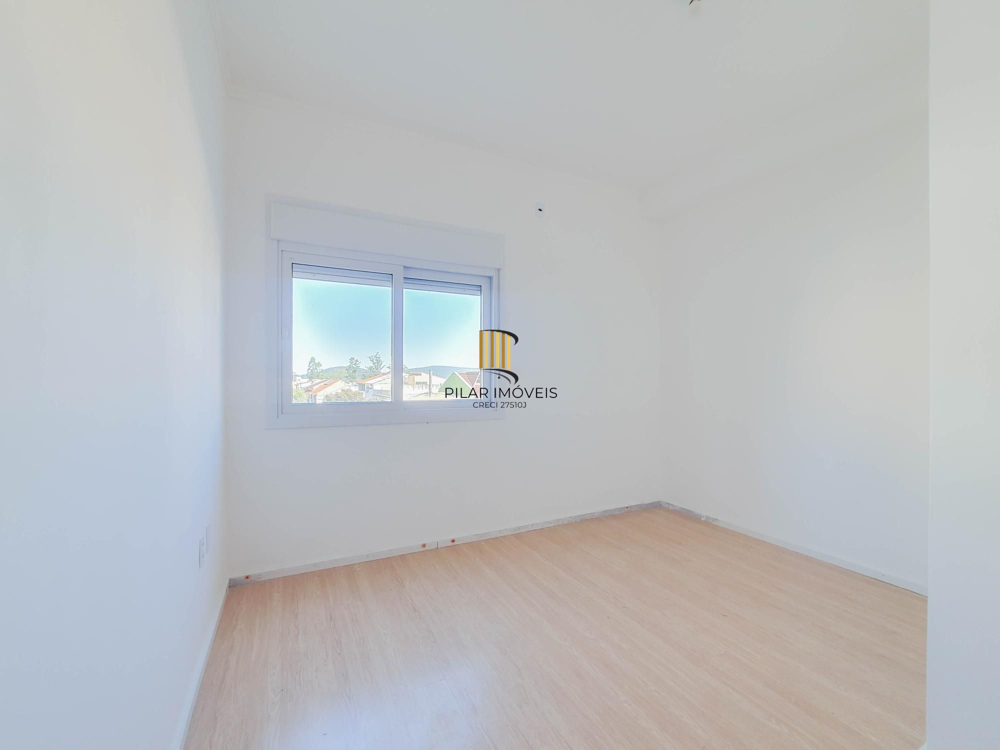 Casa 3 dormitórios no bairro Guarujá