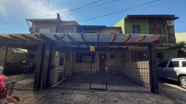 Casa em Porto Alegre, no bairro Hípica, com 3 dormitório(s), à venda. - Pilar Imóveis
