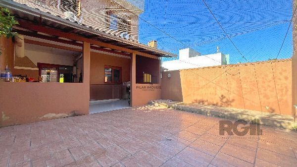 Casa em Porto Alegre, no bairro Hípica, com 3 dormitório(s), e 3 banheiros, à venda.