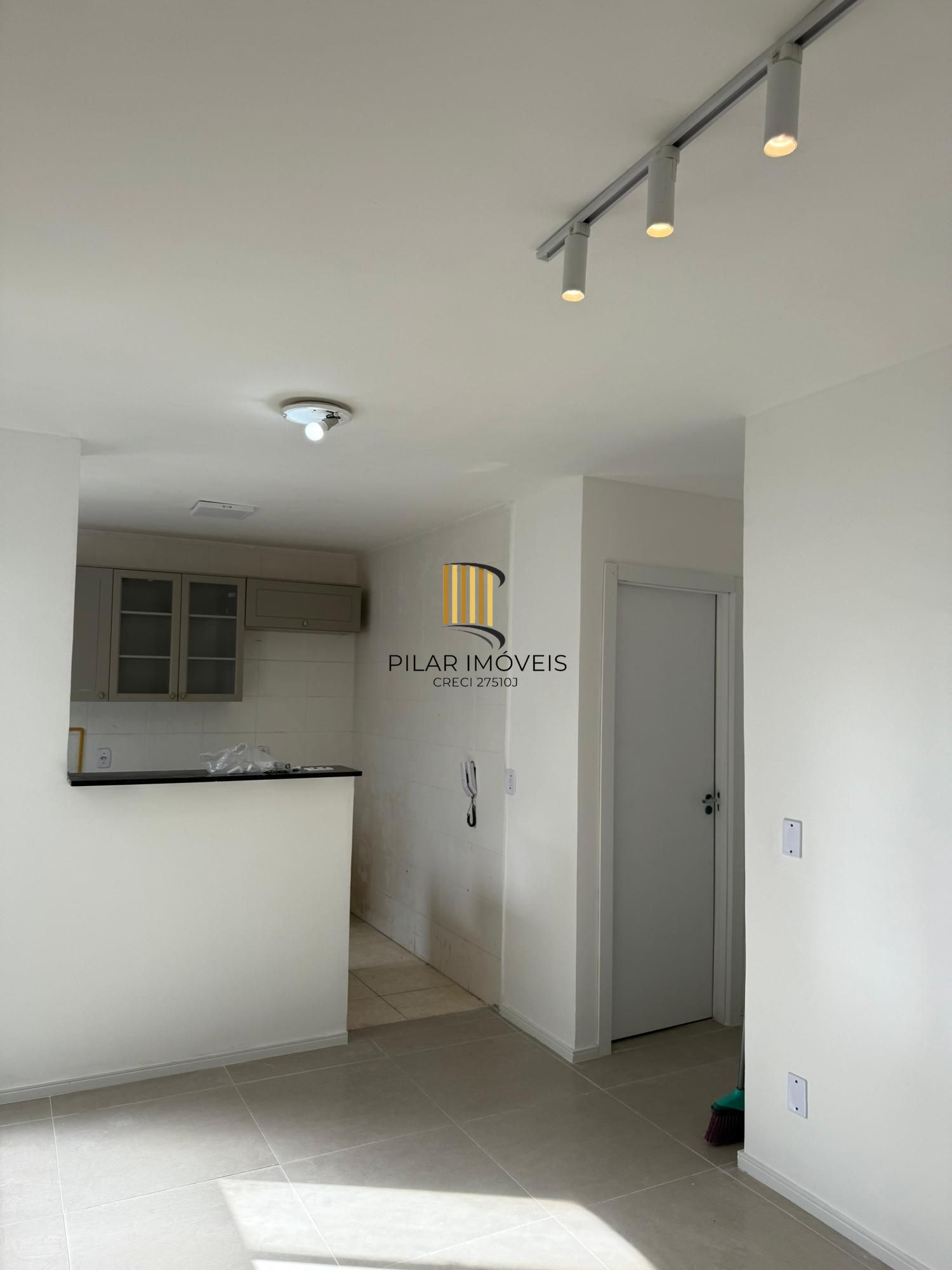 Apartamento 2 quartos, térreo, vaga fixa de garagem, zona sul-Poa.