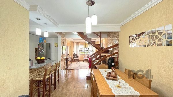 Casa Condominio em Porto Alegre, no bairro Hípica, com 3 dormitório(s), e 3 banheiros, à venda.