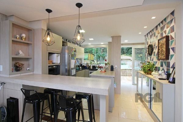 Casa Condominio em Porto Alegre, no bairro Sétimo Céu, com 4 dormitório(s), e 4 banheiros, à venda.