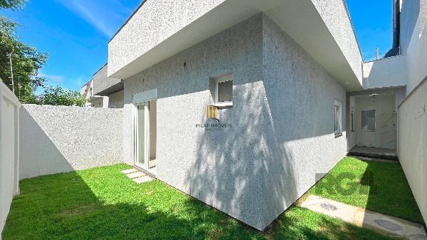 Casa Condominio em Porto Alegre, no bairro Hípica, com 3 dormitório(s), e 3 banheiros, à venda.