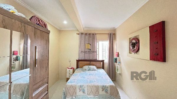 Casa em Porto Alegre, no bairro Hípica, com 2 dormitório(s), e 2 banheiros, à venda.