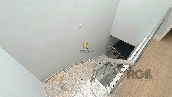 Casa em Porto Alegre, no bairro Hípica, com 3 dormitório(s), e 3 banheiros, à venda.