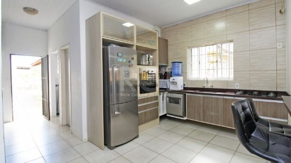 Casa em Porto Alegre, no bairro Medianeira, com 5 dormitório(s), e 5 banheiros, à venda.