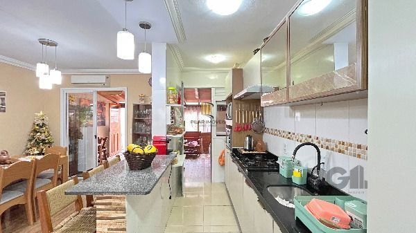 Casa Condominio em Porto Alegre, no bairro Hípica, com 3 dormitório(s), e 3 banheiros, à venda.