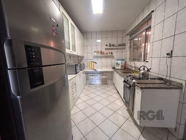 Casa 3 dormitórios no bairro Partenon