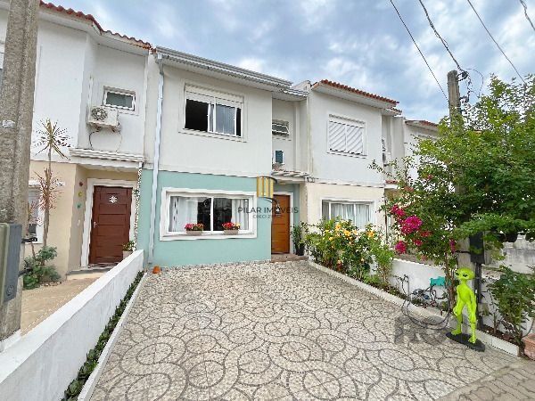 Casa Condominio em Porto Alegre, no bairro Hípica, com 3 dormitório(s), e 3 banheiros, à venda.