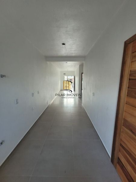 Casa em Porto Alegre, no bairro Hípica, com 3 dormitório(s), e 3 banheiros, à venda.