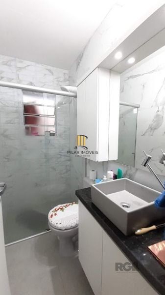 Casa Condominio em Porto Alegre, no bairro Vila Nova, com 3 dormitório(s), à venda.