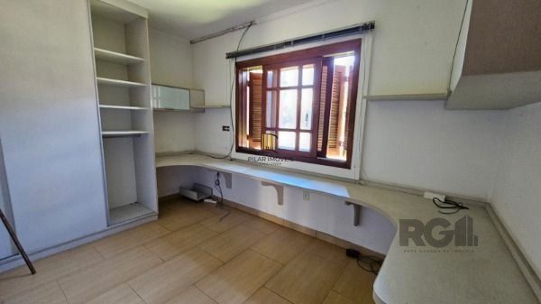 Casa 3 dormitórios no bairro Camaquã