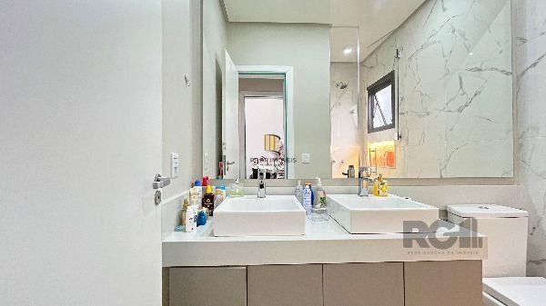 Casa Condominio em Porto Alegre, no bairro Hípica, com 3 dormitório(s), à venda.