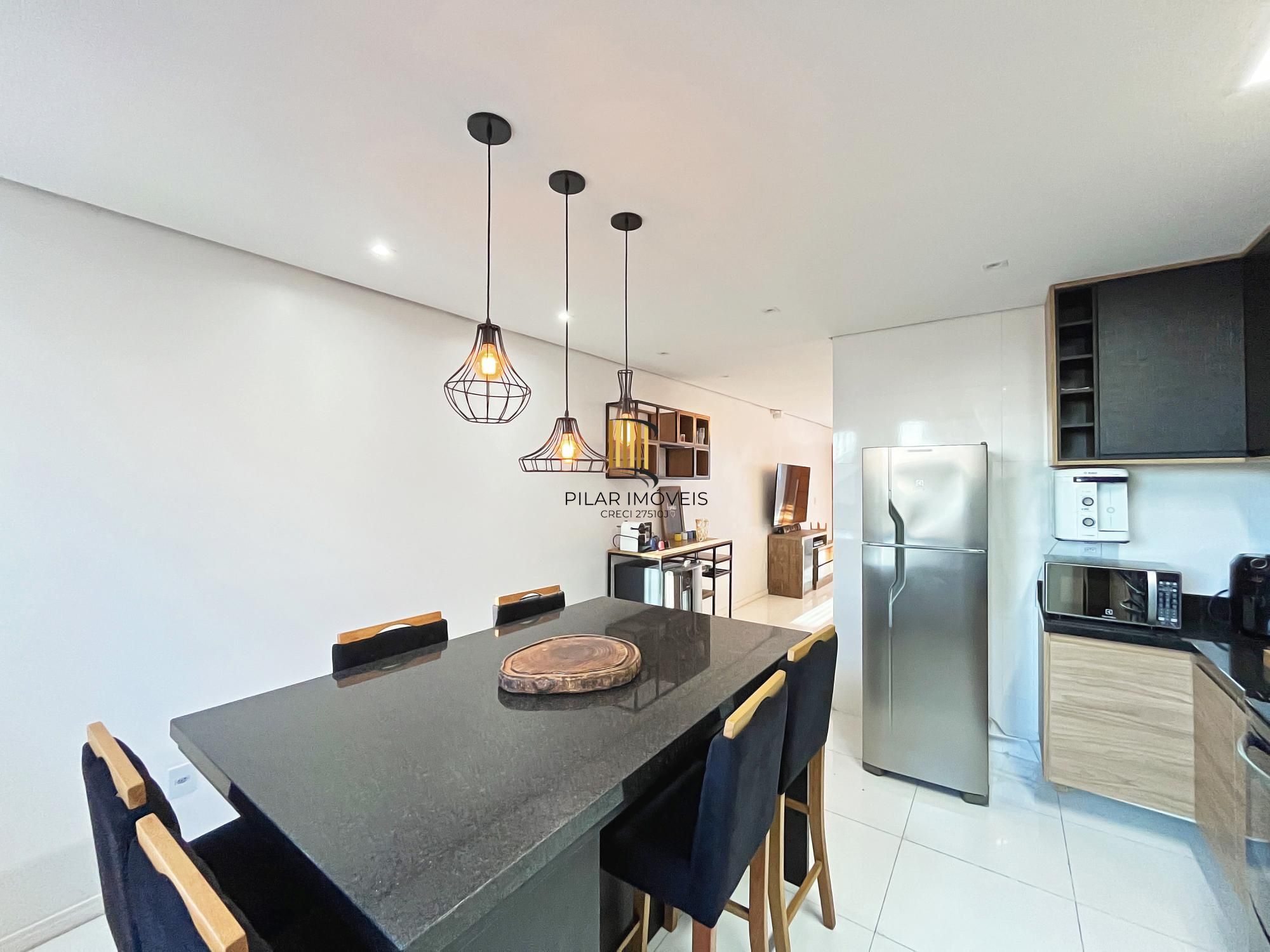 Casa 3 dormitórios no bairro Guarujá