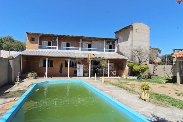 Casa para Venda - 220m², 4 dormitórios, sendo 2 suites, 5 vagas - Vila Nova