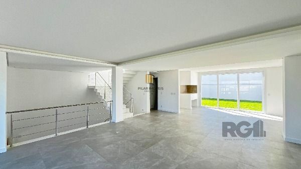 Casa Condominio em Porto Alegre, no bairro Hípica, com 3 dormitório(s), e 3 banheiros, à venda.