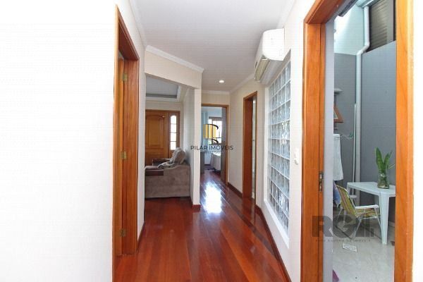 Casa em Porto Alegre, no bairro Belém Novo, com 3 dormitório(s), e 3 banheiros, à venda.