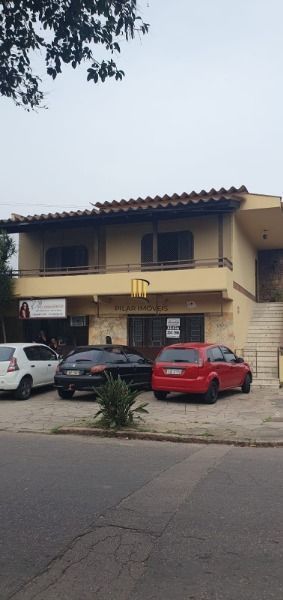 Casa em Porto Alegre, no bairro Cavalhada, com 3 dormitório(s), e 3 banheiros, à venda. - Pilar Imóveis