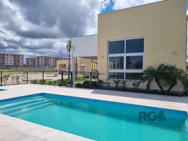 Casa Condominio em Porto Alegre, no bairro Hípica, com 3 dormitório(s), e 3 banheiros, à venda.