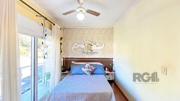 Casa Condominio em Porto Alegre, no bairro Vila Nova, com 3 dormitório(s), e 3 banheiros, à venda.